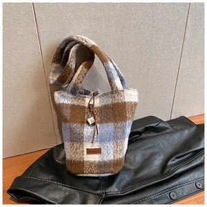 Fashionable contrast color plaid plush tote bag with drawstring and leather logo tag