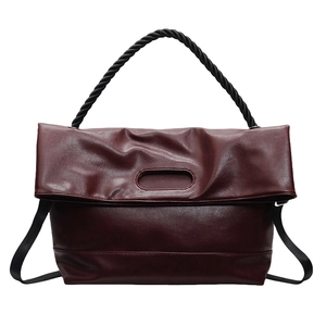 Minimalist burgundy soft PU leather shoulder bag with black woven handle and crossbody strap