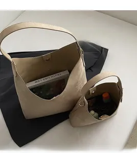 Top view of two-piece beige faux suede tote bag set showing spacious inner capacity