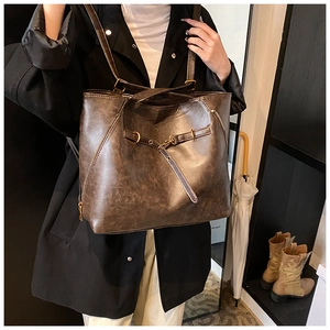 Retro deep brown tote bag with vintage oil wax leather texture and buckle details