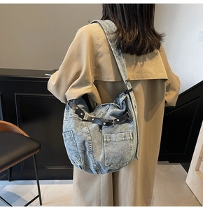 Fashionable large capacity light blue denim hobo bag with silver studs and side pockets