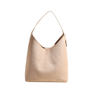 Minimalist beige hobo bag in soft pebbled leather with top handle and spacious design