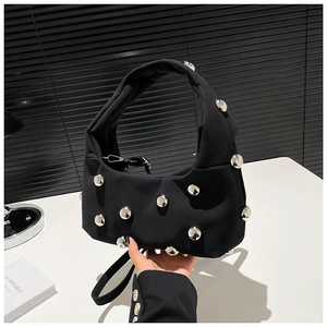 Chic black underarm bag with silver metallic studs and wide handle for trendy women