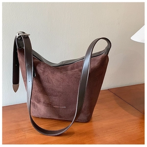 Brown suede bucket shoulder bag with adjustable strap and Fashion & Bags logo detail
