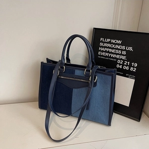 Fashionable denim patchwork tote bag with large capacity and shoulder strap for daily commuting