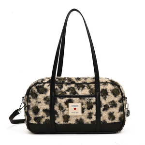 Chic leopard print plush shoulder bag with black faux leather base and large capacity