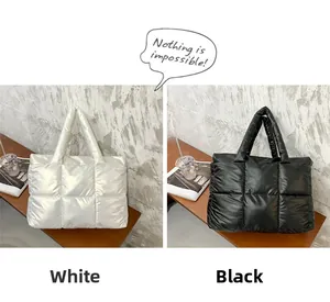Detailed comparison of white and black puffer tote bags with diamond quilted texture