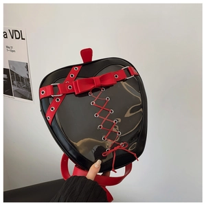 Apple shaped black and red PU leather backpack with bow detail and lace-up design