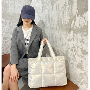 Chic white quilted nylon puffer tote bag with waterproof finish and large capacity