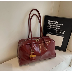 Chic burgundy PU leather tote bag with long handles and golden lock charm for women