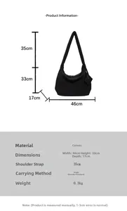 Detailed size chart showing dimensions for black canvas shoulder bag with measurement table