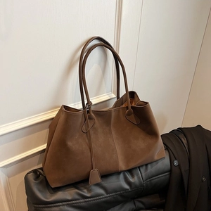 Large dark brown faux suede tote bag with slim handles for women commute or daily use