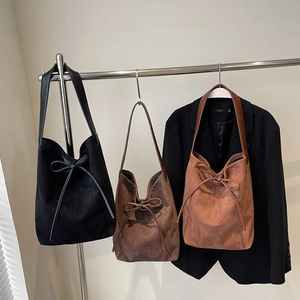 Fashion nylon tote bag with bow drawstring and leather straps in three classic colors