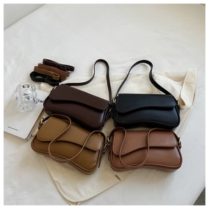 Minimalist leather shoulder bags in four colors with stylish wavy flap and gold hardware