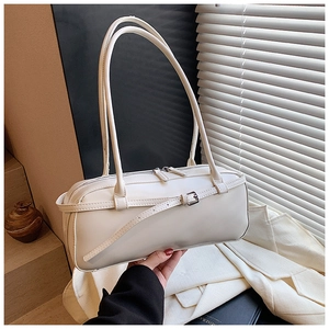 Minimalist white PU leather baguette shoulder bag with buckle detail for daily commute