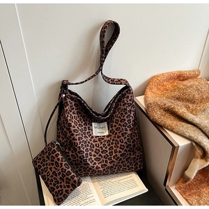 Leopard print canvas tote bag set with matching small pouch for stylish commuting