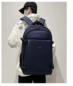 Men's navy business backpack featuring side buckle straps and wear-resistant nylon fabric