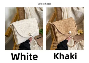 Detail view of woven straw shoulder bags in white and khaki featuring pearl button closure
