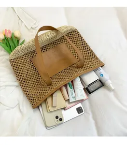 Top view of woven straw beach bag showing spacious interior with cosmetics and essentials