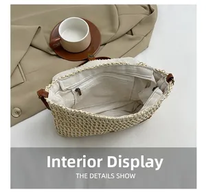 Interior detail of straw crossbody bag showing fabric lining and internal zipper pocket