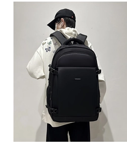 Detail of multi-functional black business backpack with reinforced buckles and side pockets