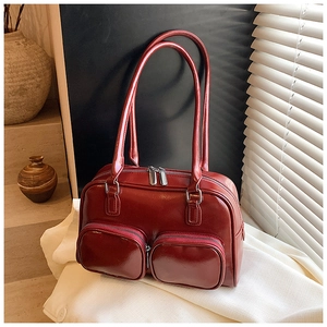 Minimalist deep red double pocket shoulder bag in glossy faux leather for women