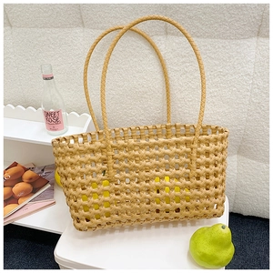 Handwoven beige hollow beach tote bag for women with wide straps for summer vacation
