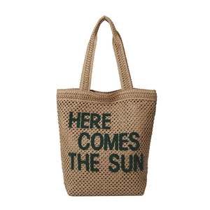 Handmade woven beach tote bag with Here Comes The Sun green embroidery detail