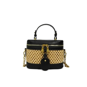 Handmade bamboo weave handbag with black leather trim and gold chain strap in retro style
