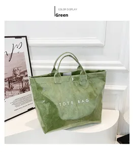 Detail view of a green waterproof DuPont paper tote bag with unique crinkled texture