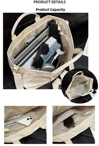 Detailed interior of cream white tote bag showing spacious capacity for laptop and accessories