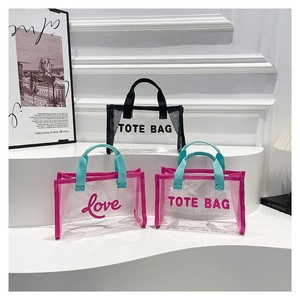 Minimalist transparent PVC tote bag with mesh side panels and stylish letter print