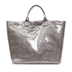 Sac fourre-tout argenté avec couche extérieure en PVC transparent et texte TOTE BAG blanc