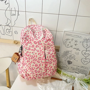 Pink leopard print canvas backpack with cute toast plush charm for school and daily commute