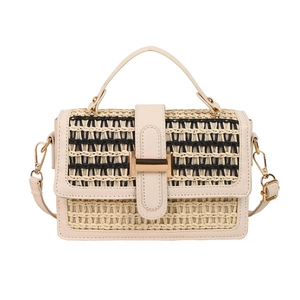 Borsa a tracolla in paglia da donna con texture nera e manici in pelle bianca