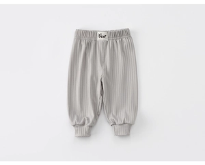 Detail of light grey ribbed cotton pants with elastic waist and Bear brand label