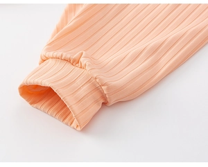 Close-up of ribbed knit cuffs on children's anti-mosquito pants with smooth elastic texture
