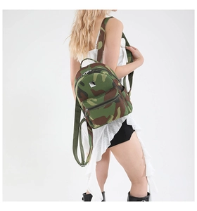 Detail view of camouflage tactical backpack with durable canvas and adjustable straps