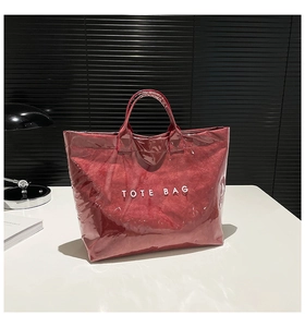 Detail of red wrinkled texture DuPont paper tote bag with transparent waterproof PVC layer