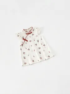 Girls traditional Chinese cheongsam dress with red cherry print and ruffle details