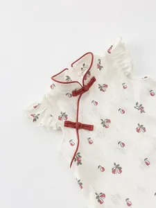 Traditional Chinese style girls sleeveless floral dress with red buttons and ruffles