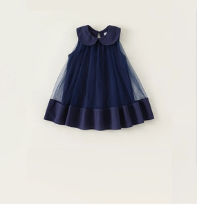 Detailed view of dark blue tulle sleeveless dress with a Peter Pan collar for girls