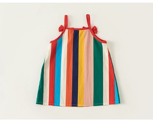 Detail of colorful vertical striped dress with red shoulder straps and bow accents