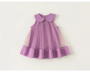 Detail view of purple sleeveless dress featuring a Peter Pan collar and layered mesh tulle