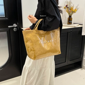Waterproof yellow Dupont paper tote bag with PVC outer layer and white TOTE BAG print