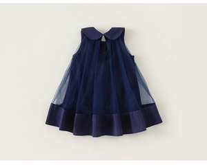 Detail of navy blue sleeveless tulle dress featuring a classic Peter Pan collar and back cutout