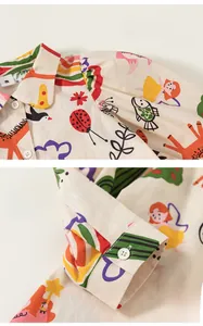 Détails de manches bouffantes et poignets boutonnés sur robe chemise pour enfant