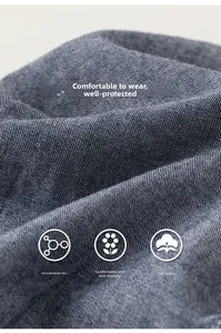 Detailed close-up of soft blue denim fabric texture for children's cotton summer shorts