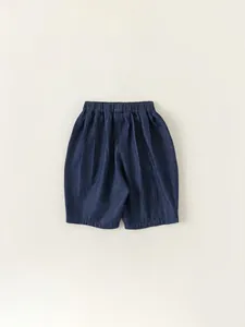 Classic dark blue denim shorts for boys featuring a comfortable elastic waist and cotton fabric