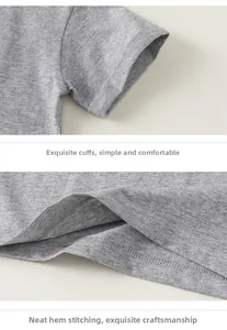Dettaglio della t-shirt in cotone grigio con polsini a volant e orlo a doppia cucitura